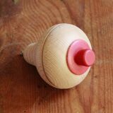 Jouet toupie en bois