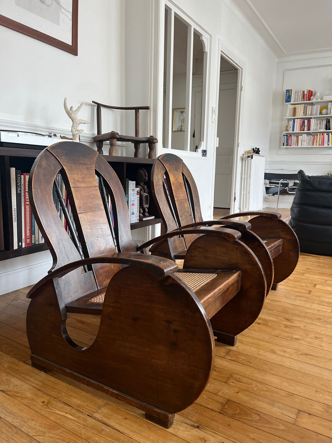 Pair of Art Deco armchairs in wood and cane.