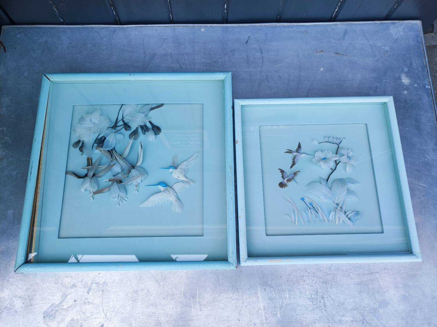 Two vintage paintings made with feathers, hummingbird motif