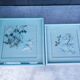 Two vintage paintings made with feathers, hummingbird motif