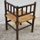 Art Deco turned wood straw corner armchair