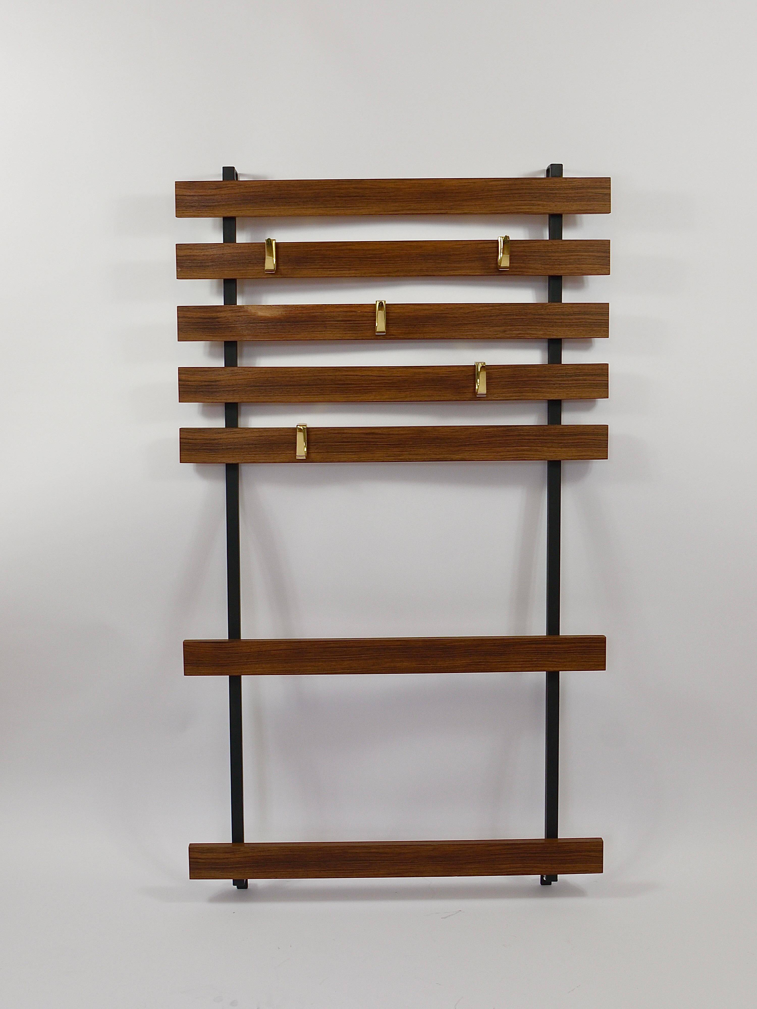 Wall coat rack by Carl Aubock with 5 brass hooks, walnut, iron, Austria, 1950s.
