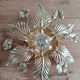 Applique murale fleur en laiton doré