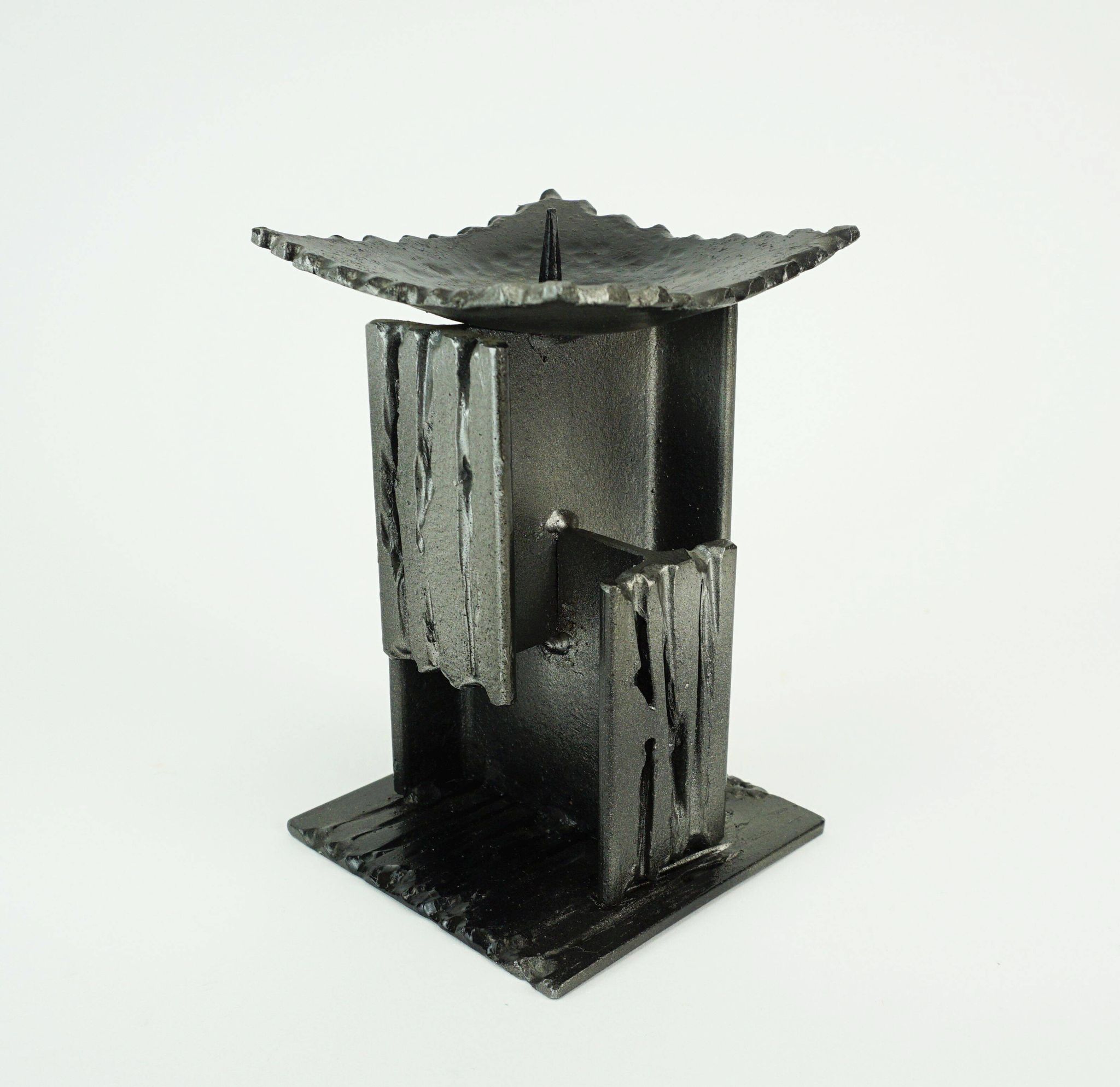 Mid century modern brutalist design iron candle holder