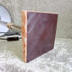 Golden metal lamp with pink marble base
