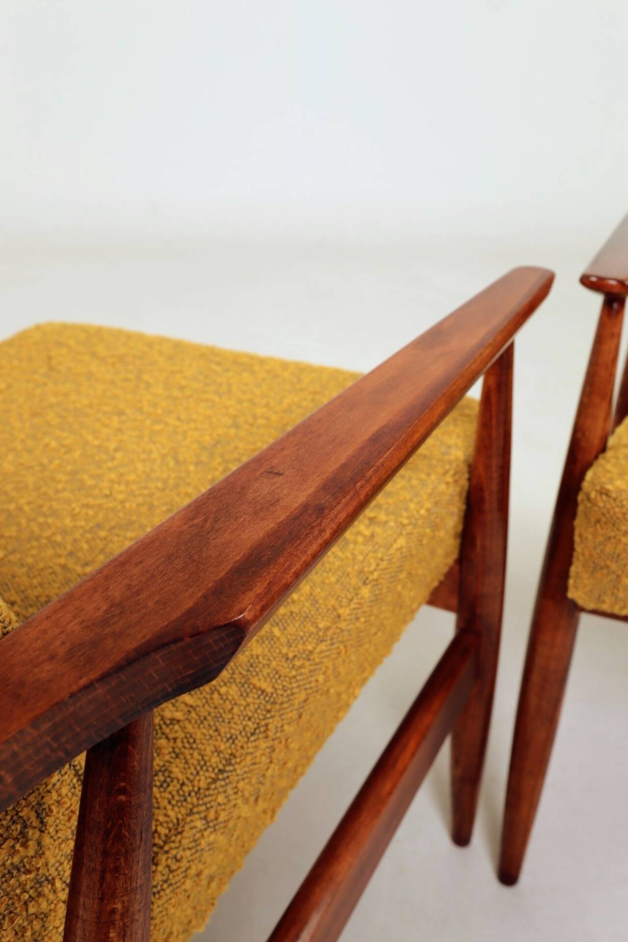 Pair of vintage boucle mustard armchairs H.Lis