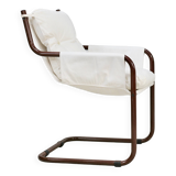 Tubular armchair, fabric suspended seat. Circa 1970
