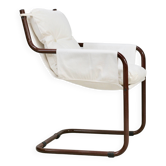 Tubular armchair, fabric suspended seat. Circa 1970