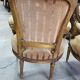 Paire de fauteuils en bois dore style Louis XVl