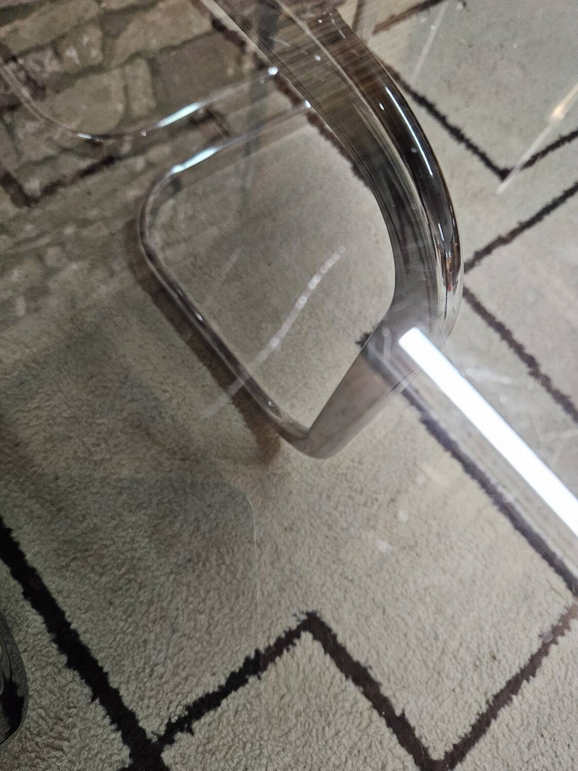 Round chrome coffee table with smoked glass