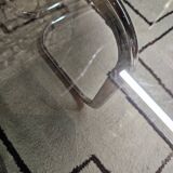 Round chrome coffee table with smoked glass
