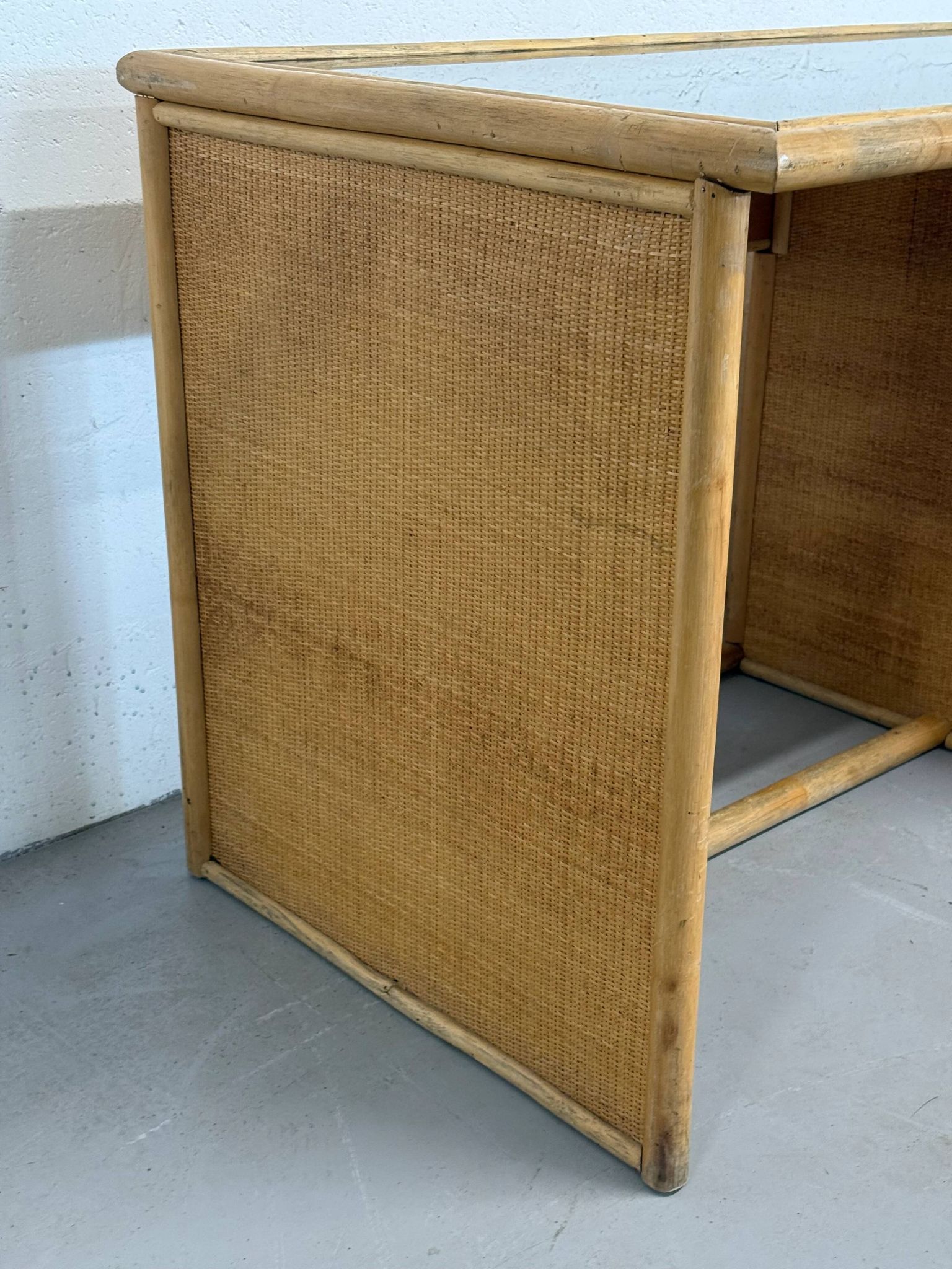 Vintage bamboo and woven rattan desk — glass top