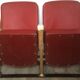 Pair of red skai leather cinema chairs
