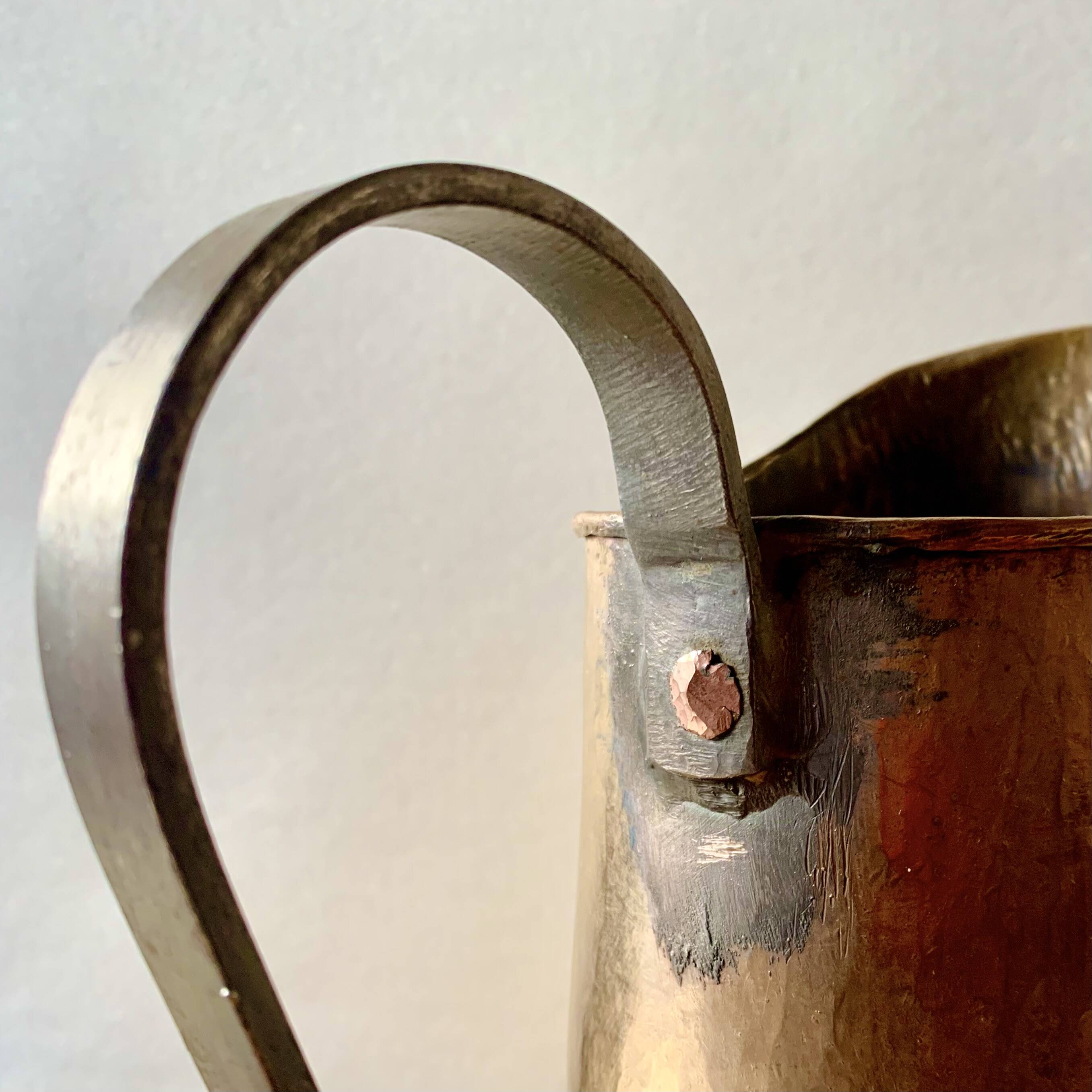 Old hammered copper water jug - artisanal work