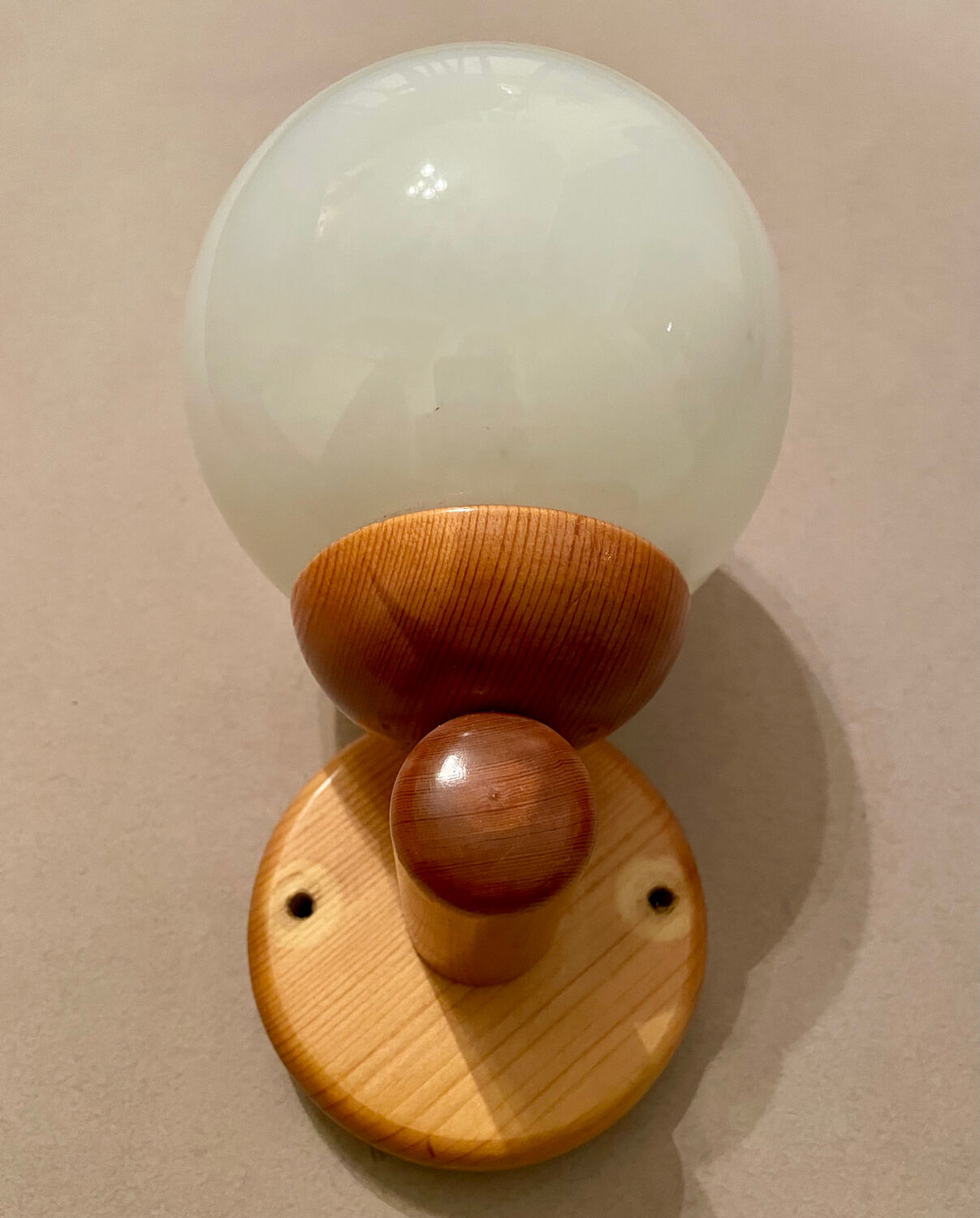 Vintage white glass wall light and pin.