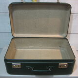 Dark green suitcase