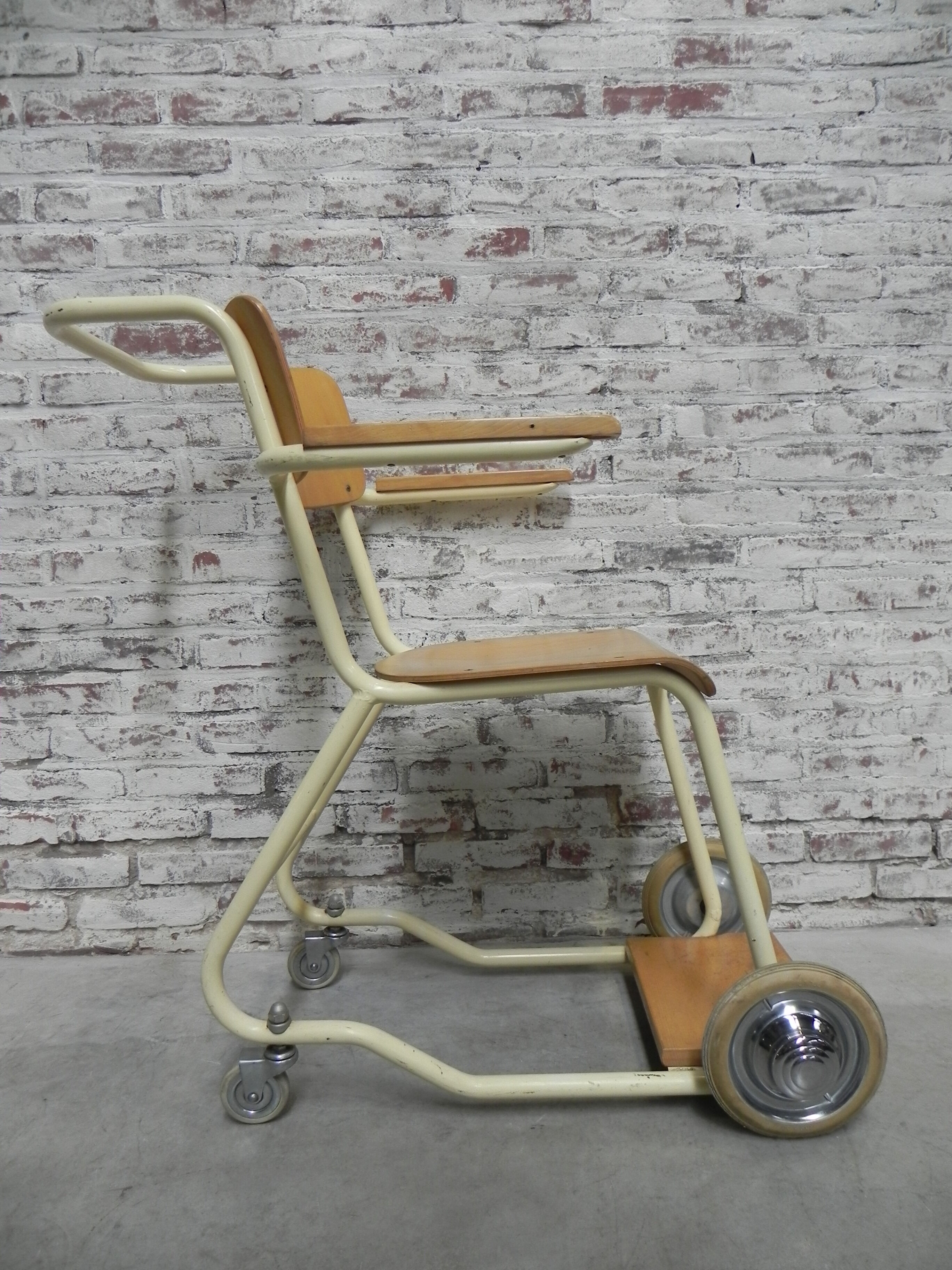 Vintage chair on wheels, wheelchair