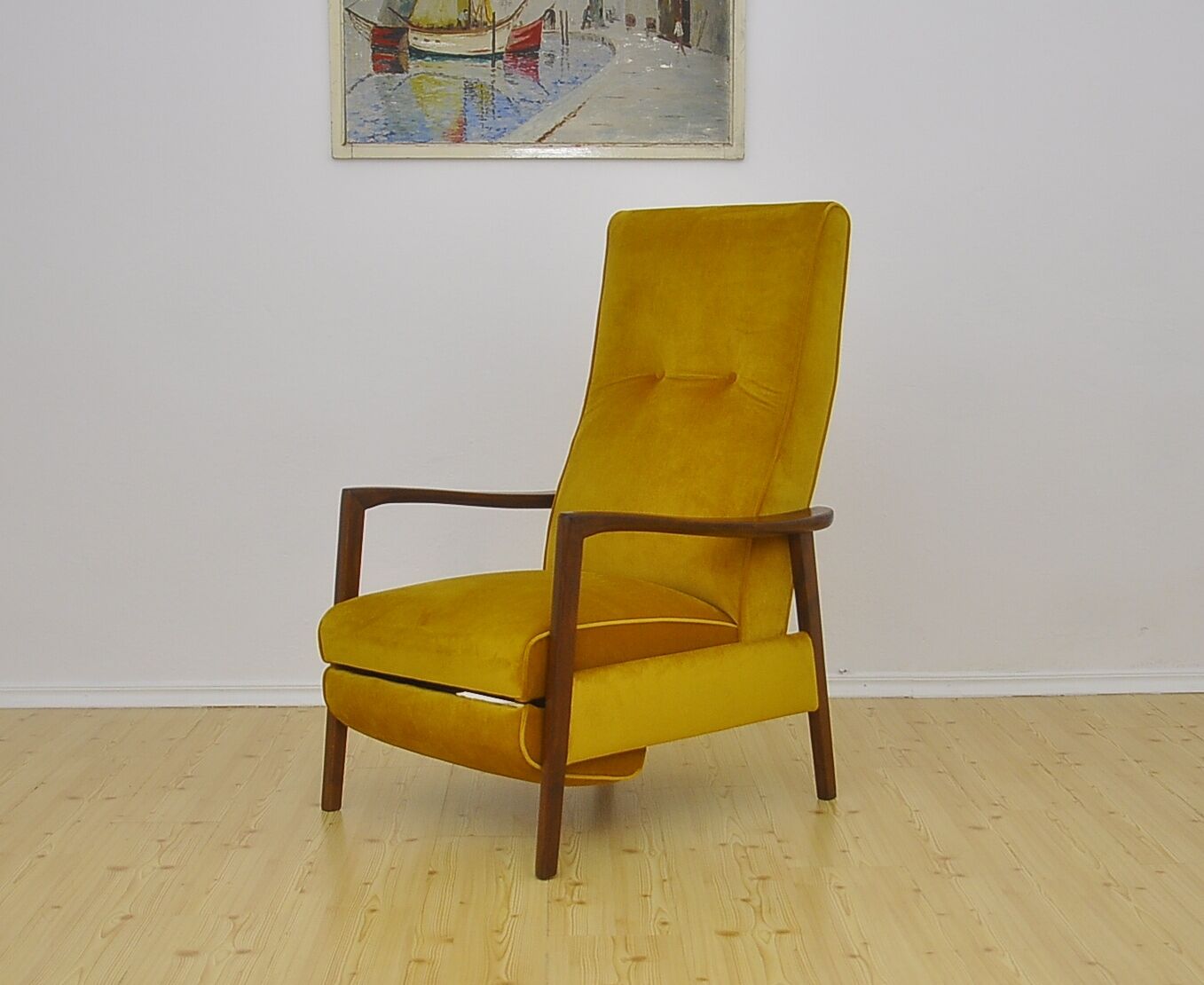 Mid-century armchair with folding footrest, 1960s