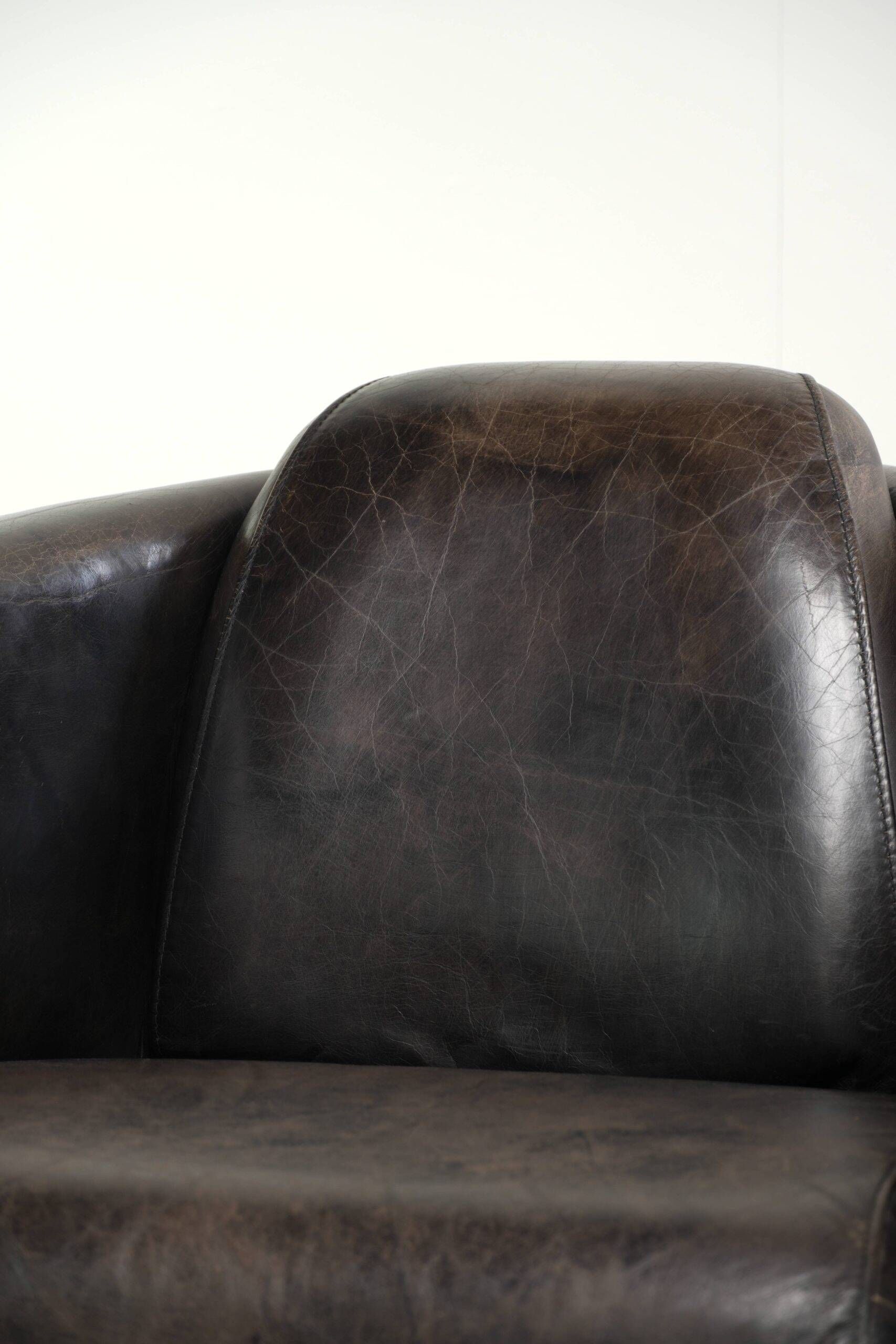 Fauteuil design Aviator en cuir de vache grainé