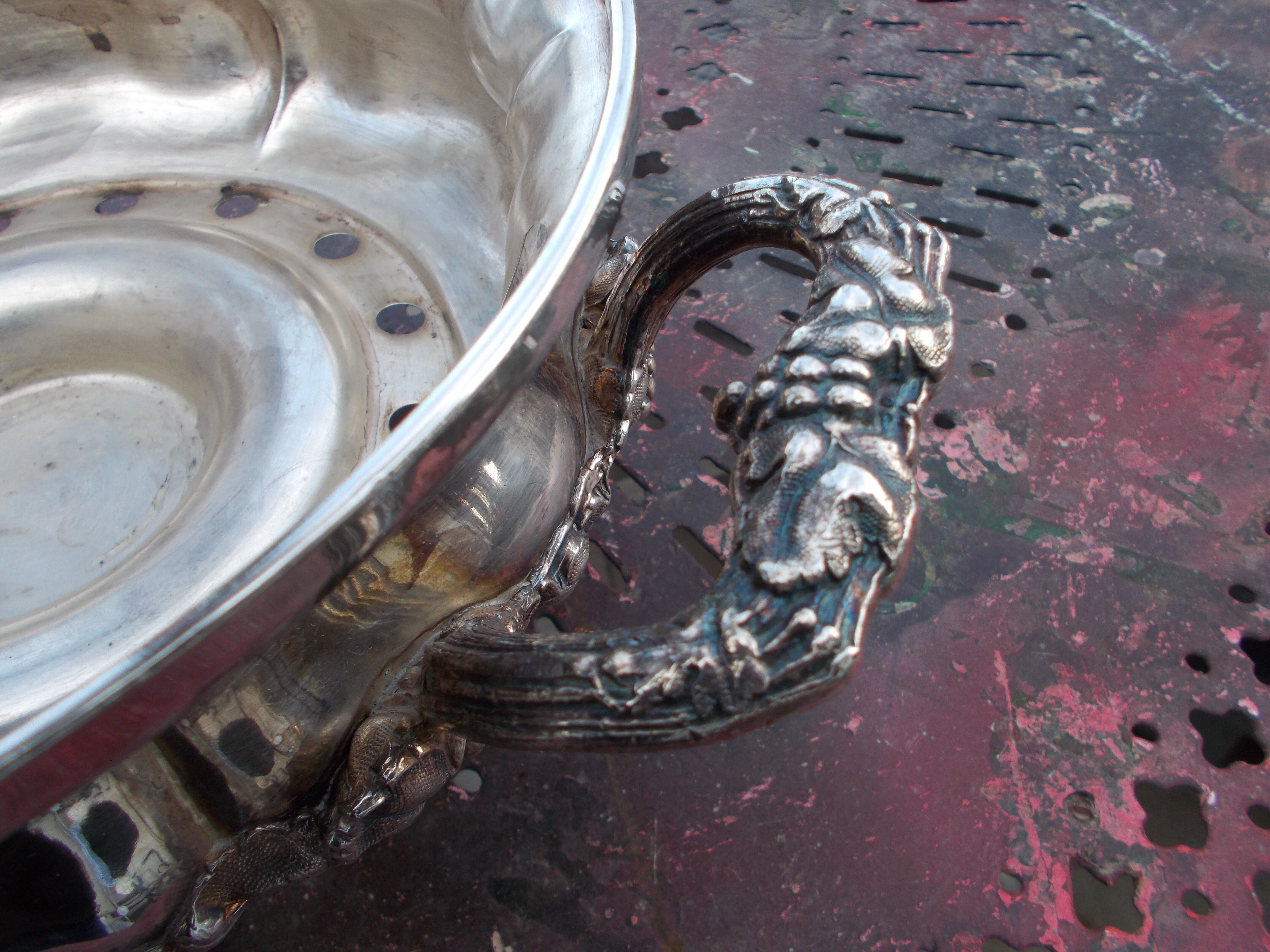 Antique silver-plated metal tealight with vine branch decoration