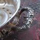 Antique silver-plated metal tealight with vine branch decoration