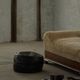 Vintage black leather pouf/ottoman with a rounded shape, French mid 20th Century.