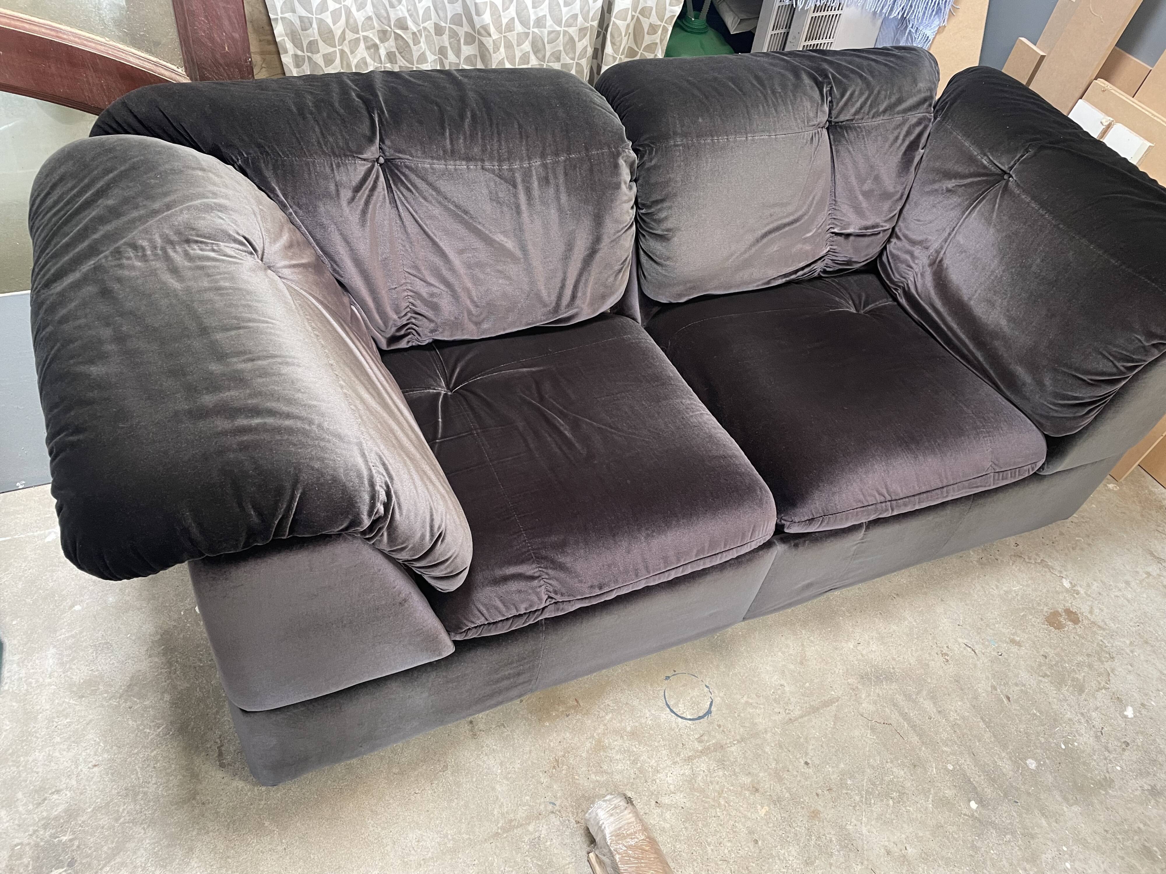 Black velvet sofa