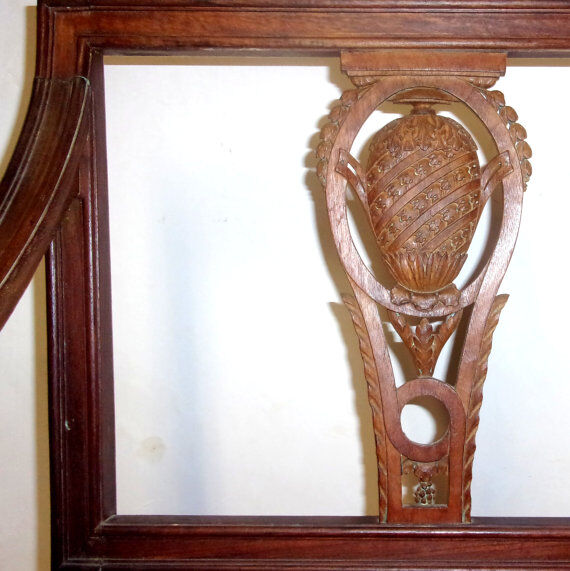 A Chair from the beginning of the 20th century in natural wood.