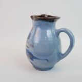 Large blue pitcher with abstract pattern