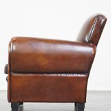 Large design armchair made of sheep leather
