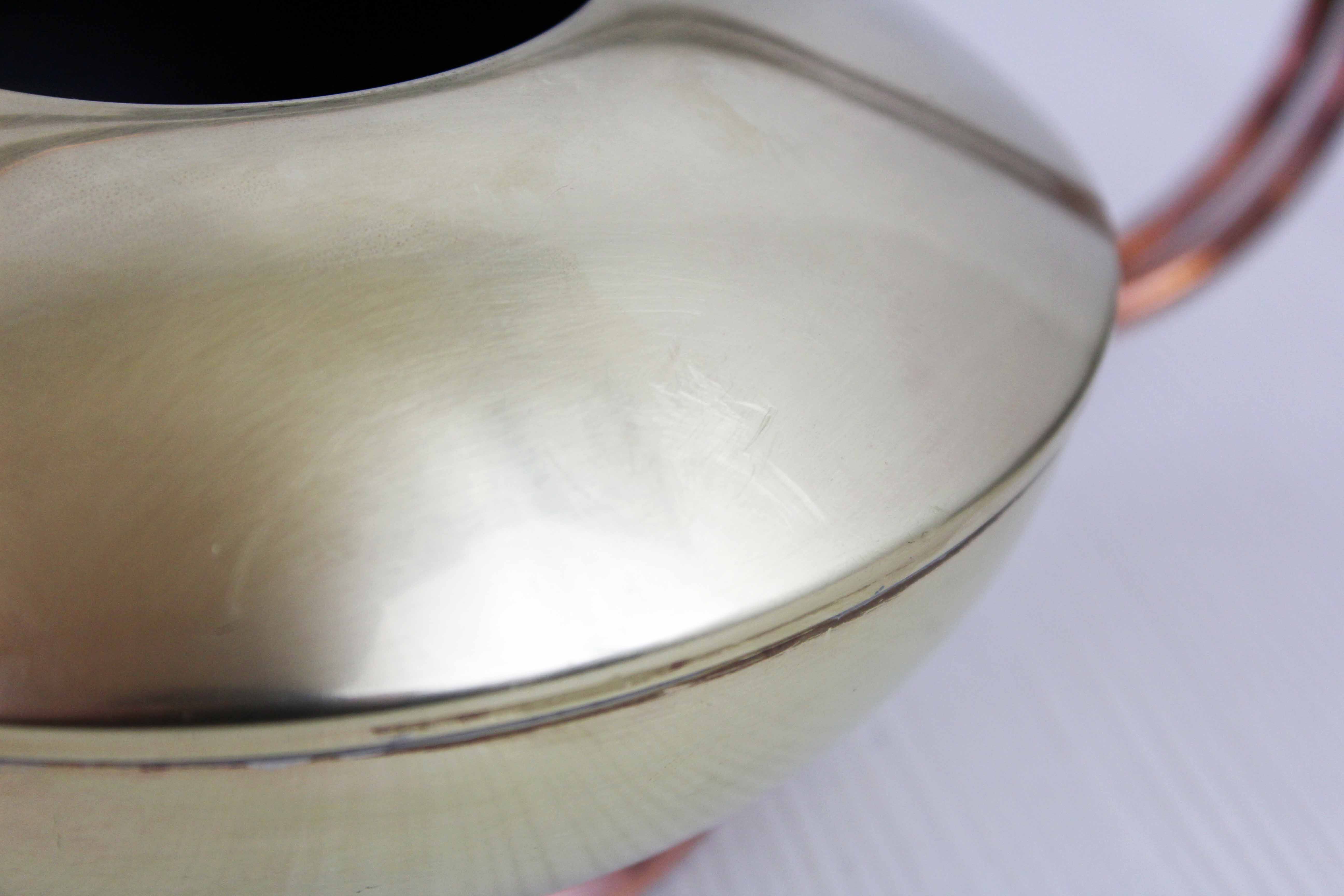 Watering can in brass and copper