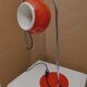 Eyeball space age orange desk or bedside lamp on an arc base