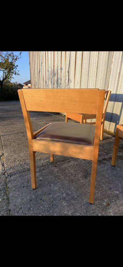 6 wooden chairs and faux leather