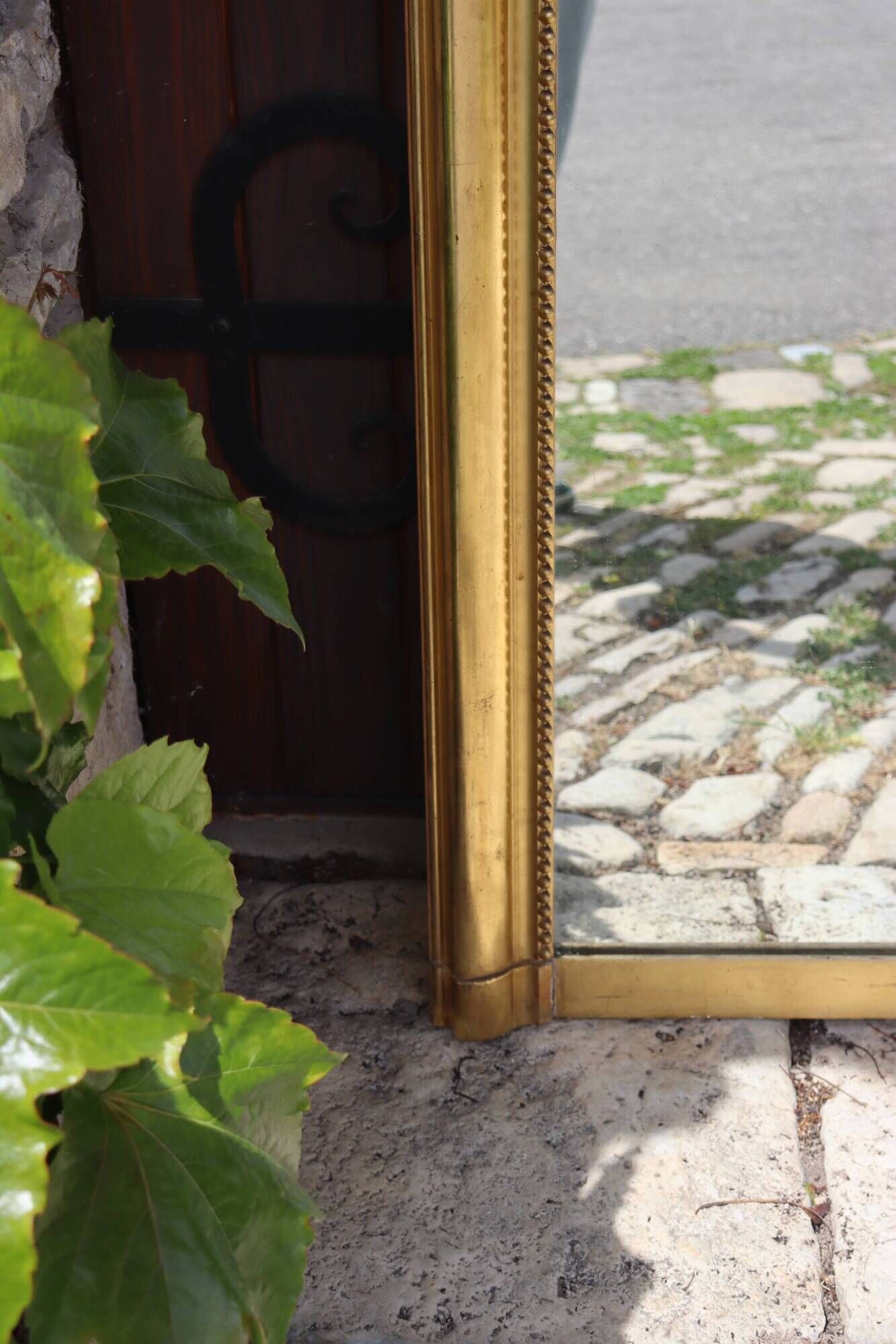 Large gold mirror in Louis XV style