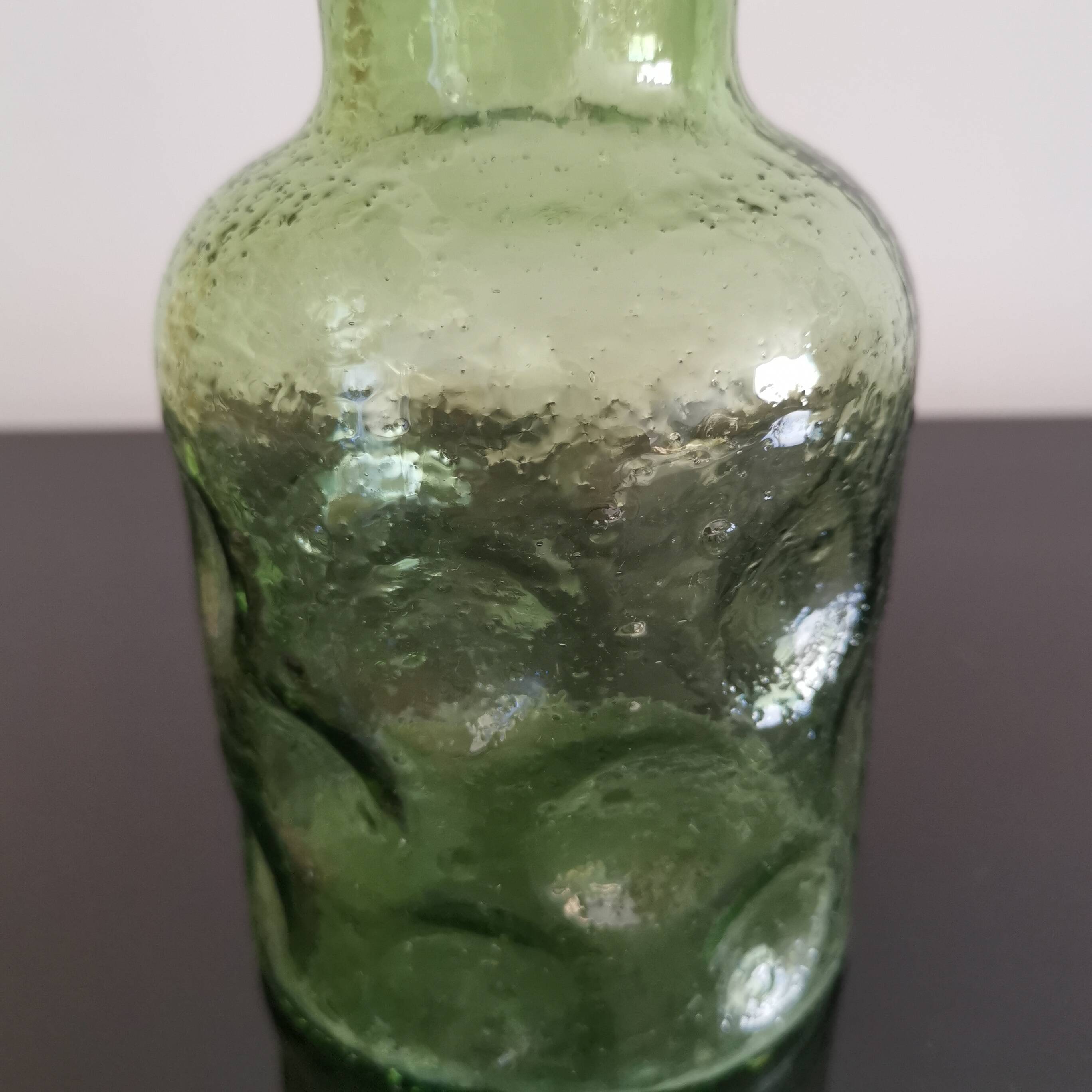 Old green glass carafe