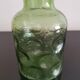 Old green glass carafe