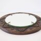 Decorative mirror in wood and gold metal