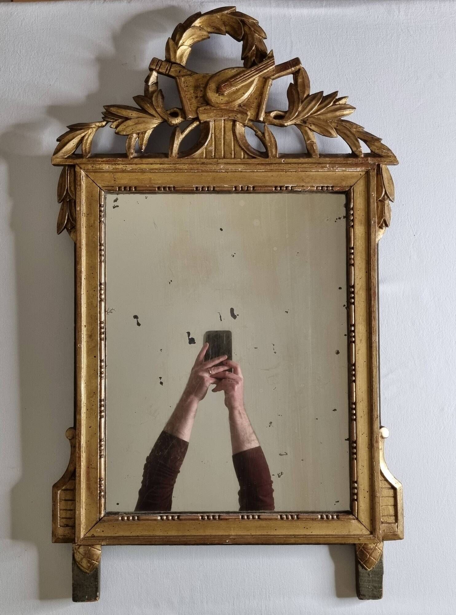 Antique carved and gilded wooden mirror, Louis XVI style – 54 x 92 cm