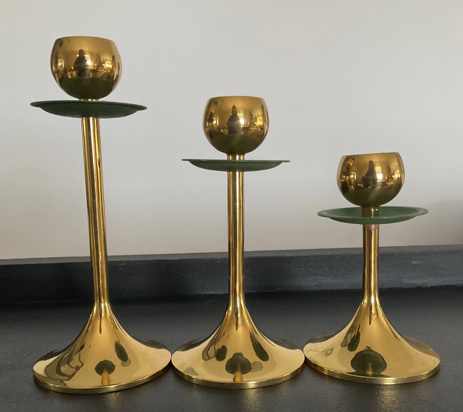 Trio of vintage brass candlesticks