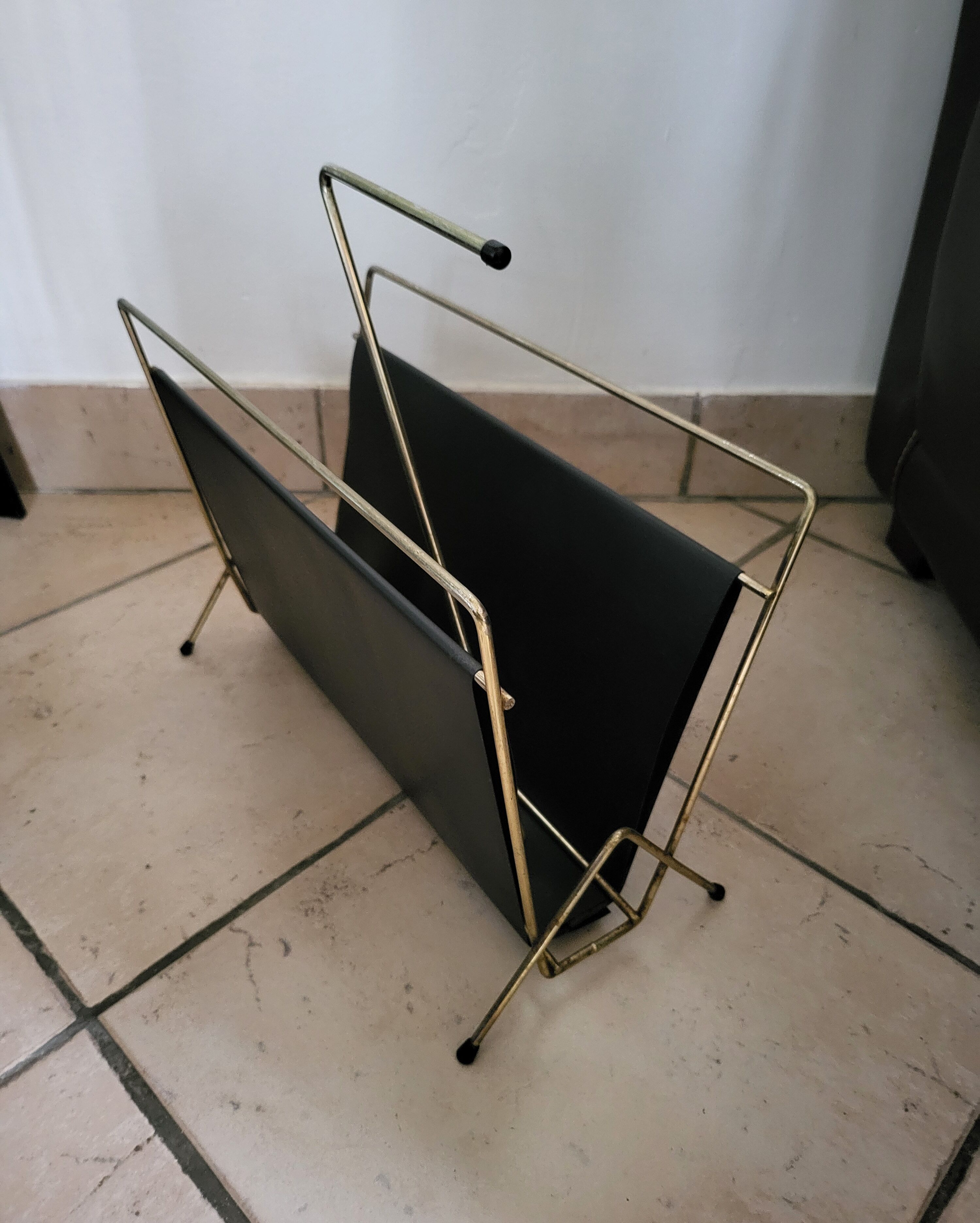 Vintage metal magazine rack in gold and black vinyl Newspaper holder