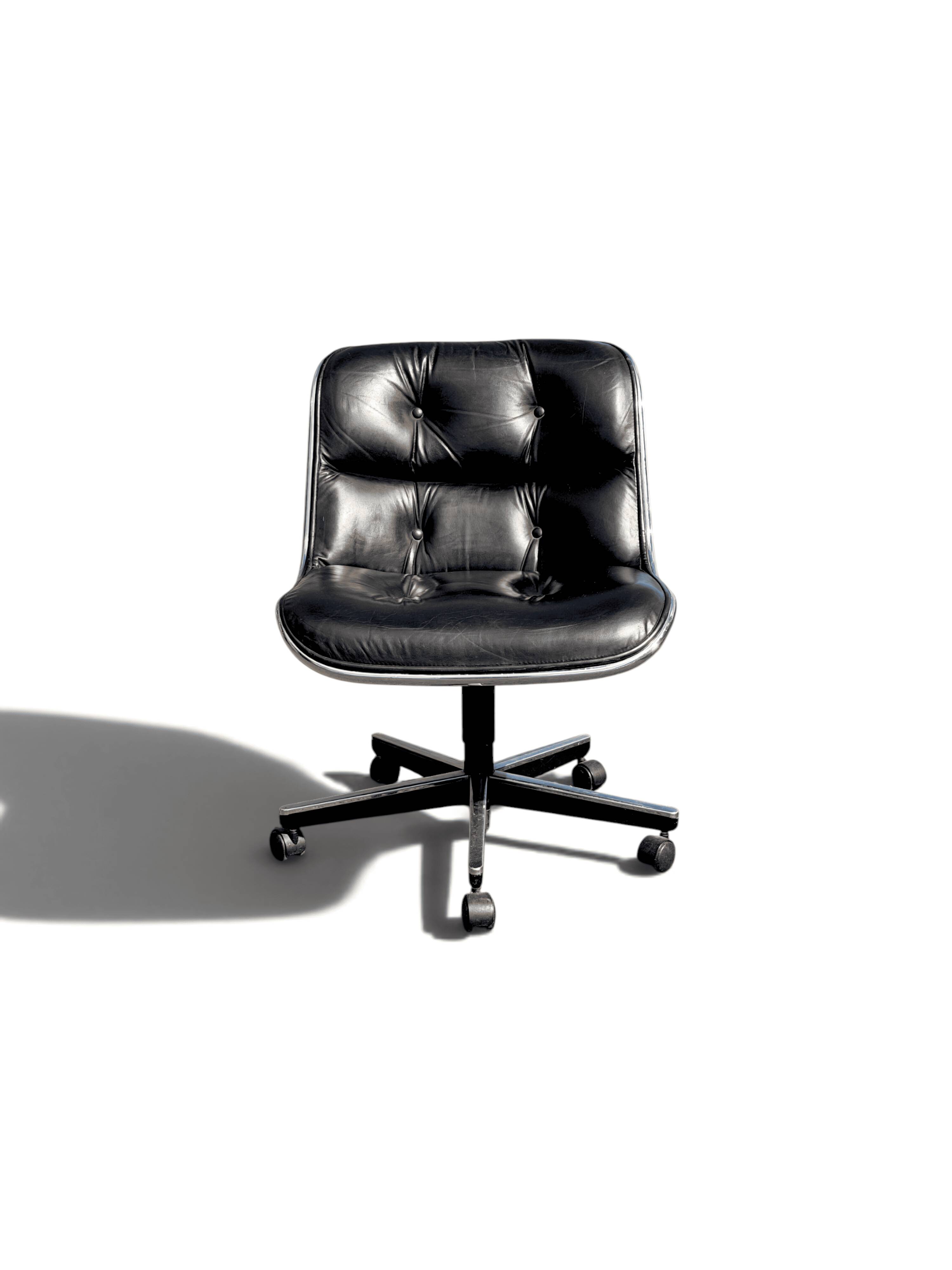 Charles Pollock Knoll office chair in black leather without armrests.