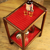 Serving in varnished chestnut and red leather