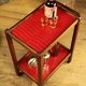 Serving in varnished chestnut and red leather