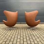 2x Fritz Hansen Egg chair by Arne Jacobsen in Cognac leather, new condition!
