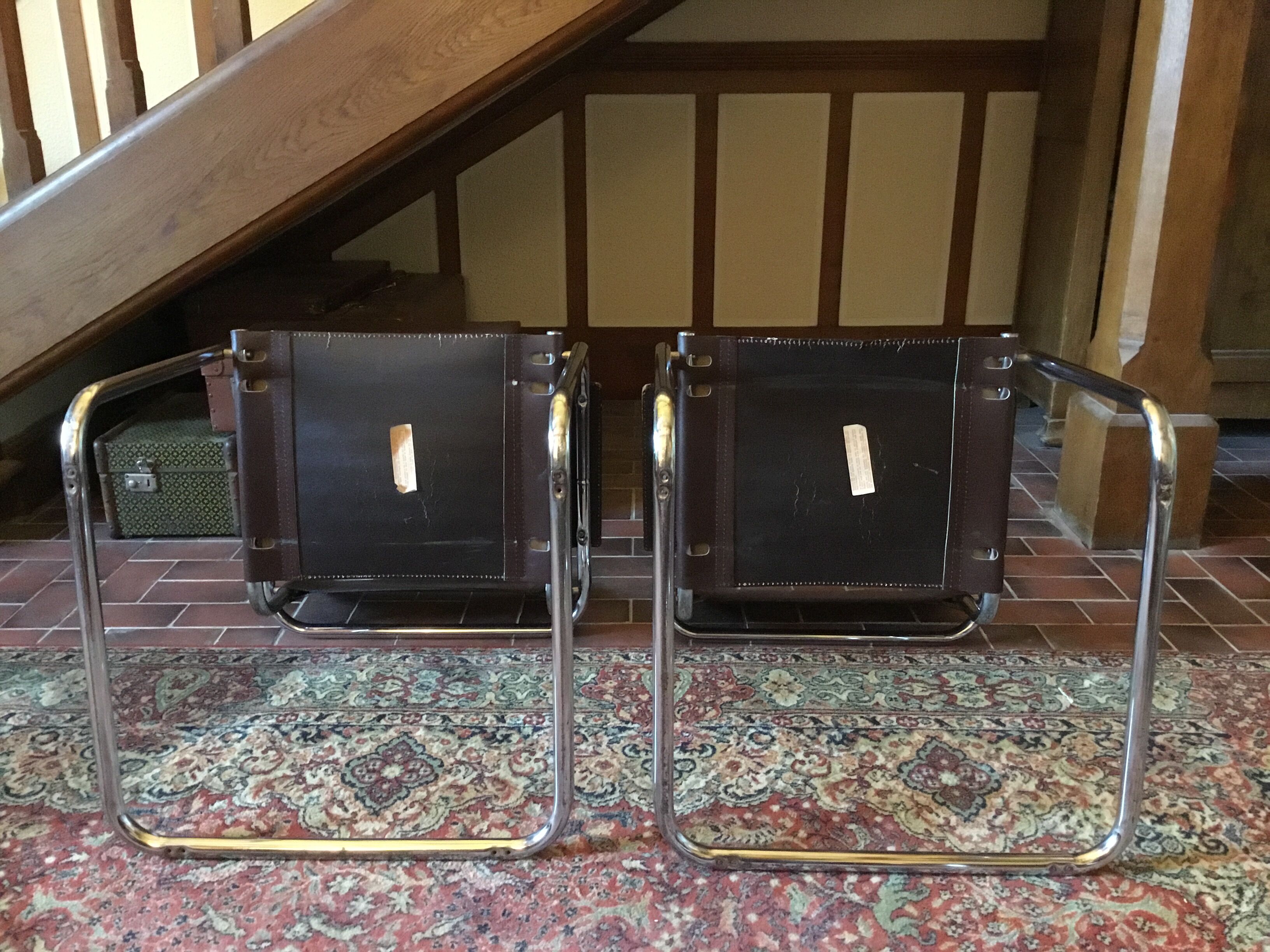 Leather and steel armchairs