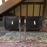 Leather and steel armchairs