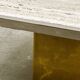 Brute travertine coffee table with brass base and chrome edges, France 1970s.