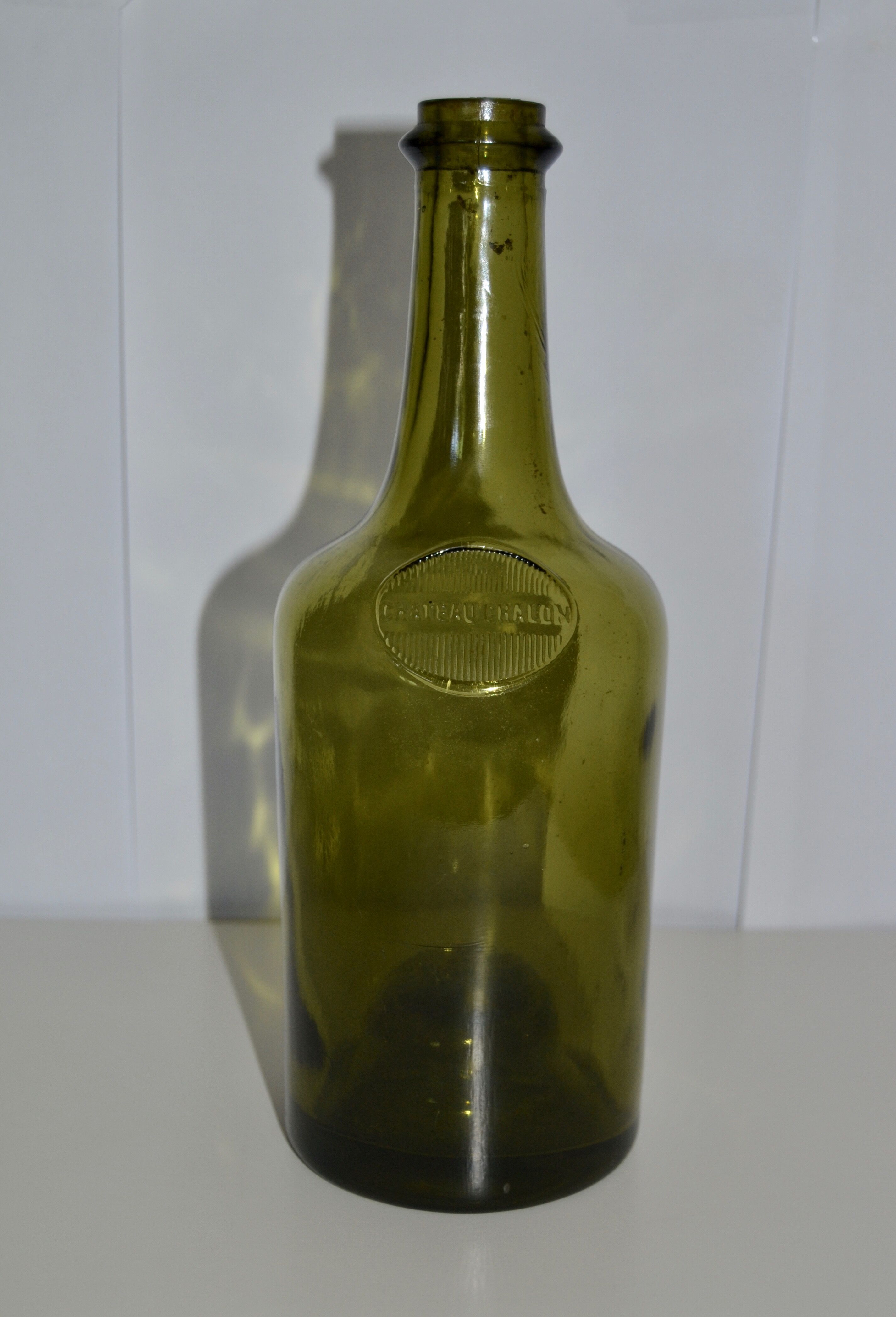 Château Chalon green glass bottle