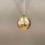 Danish ball lamp from the 80s, in gold colored lacquer.
