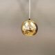 Danish ball lamp from the 80s, in gold colored lacquer.